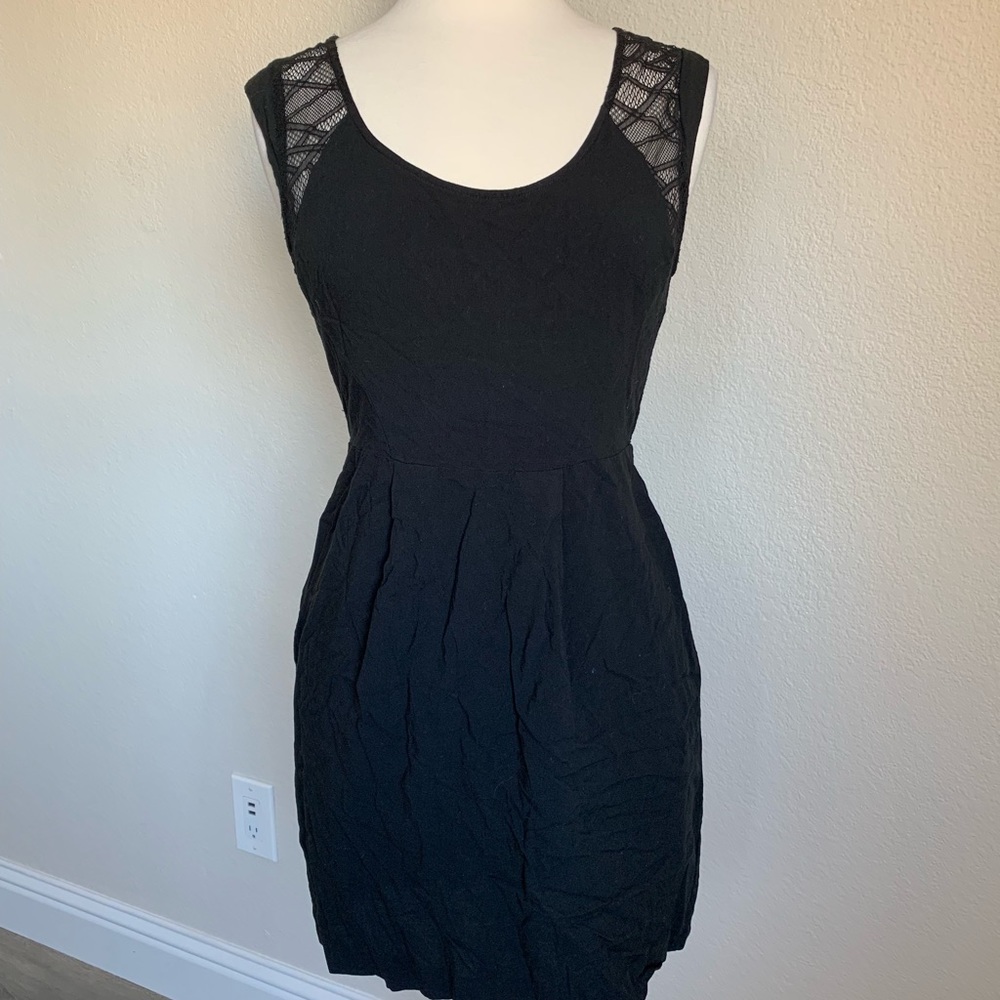 Black Mini Dress with sheer front and back.